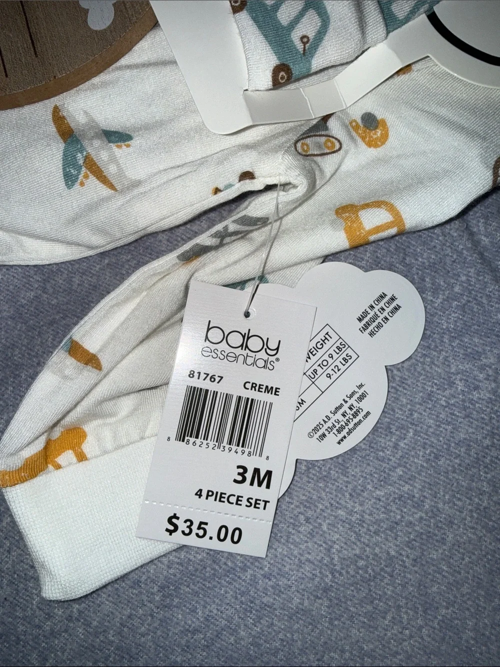 Footie, swaddle, knit cap, wood disk 4 piece gift set